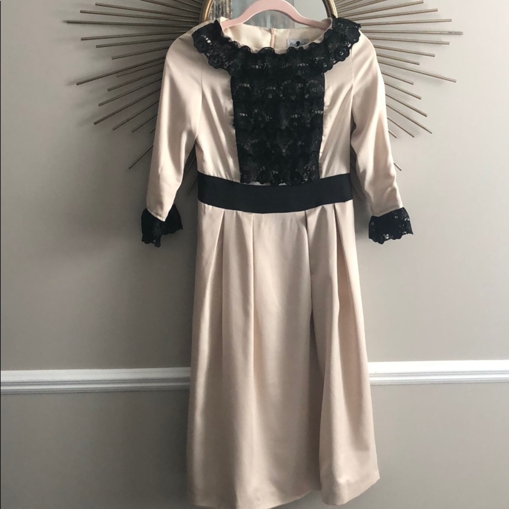 Dainty Jewell’s silk ruffle dress